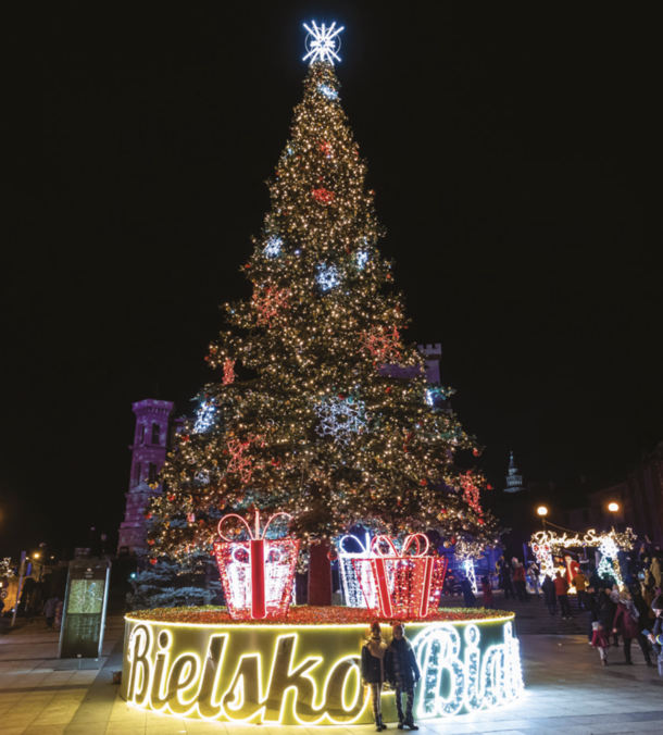 Decorate with large artificial Christmas Tree